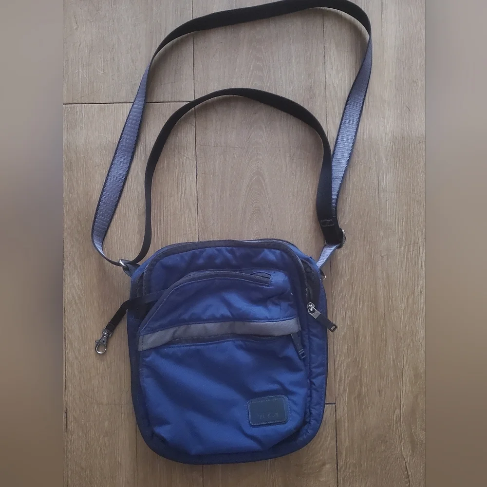 TUMI Navy Blue Organizer Travel Crossbody Bag.